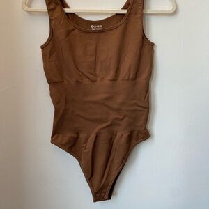 Brown OQQ bodysuit, size M